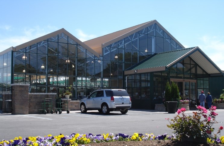 a shot from the outside of the Plymouth Nursery greenhouse from the front, in Plymouth, Michigan, using the Specialty Structures and Vail Atrium from Prospiant