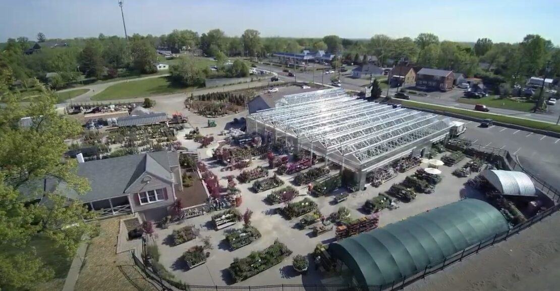 Open-roof retail greenhouse with an A-frame headhouse at White Oak Gardens