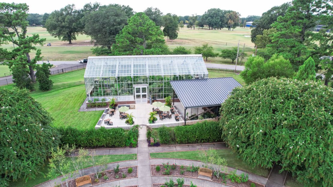 Overhead view of Memphis Botanic Garden greenhouse with patio area and covered outdoor classroom space