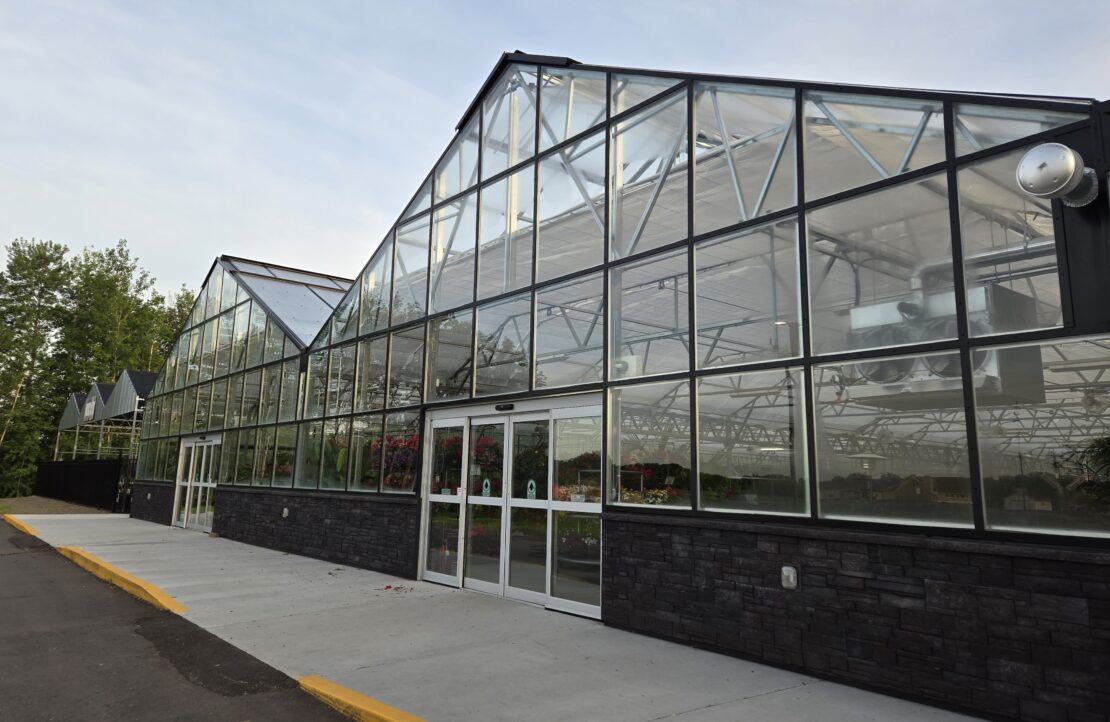 Curbside view of Koch's Hardware Vail Greenhouses used for its garden center.