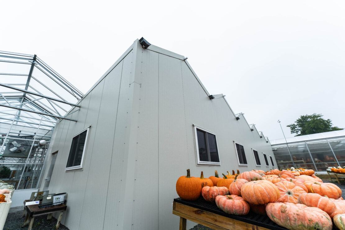 Samascott's plans to use the metal warehouses attached to its Open-Roof greenhouses for offices, storage, and retail space.