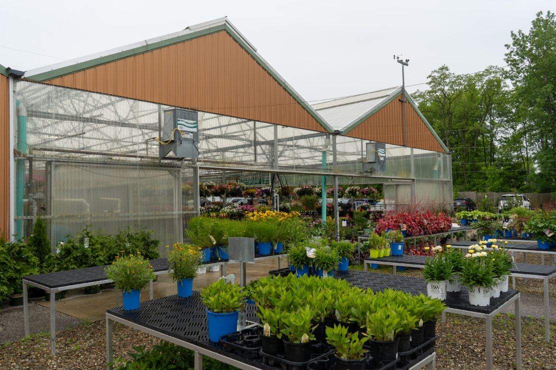 Sturdy plant benching allows retailers to organize outdoor displays for a better shopping experience.