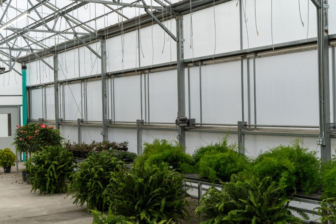 Guillotine side vents or EDDG vents in a Vail a-frame greenhouse allow for easy cross ventilation when its needed.