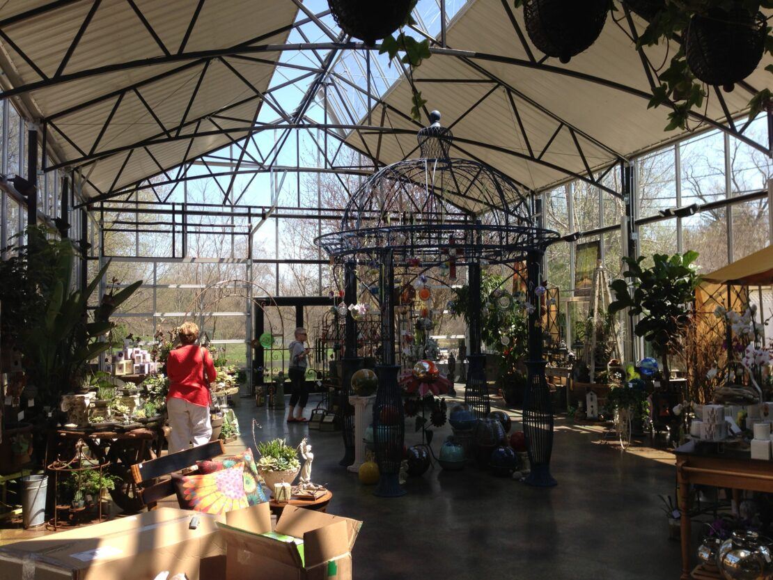 Metal cladding can be used in different ways on an a-frame greenhouse to make a retail space shine.