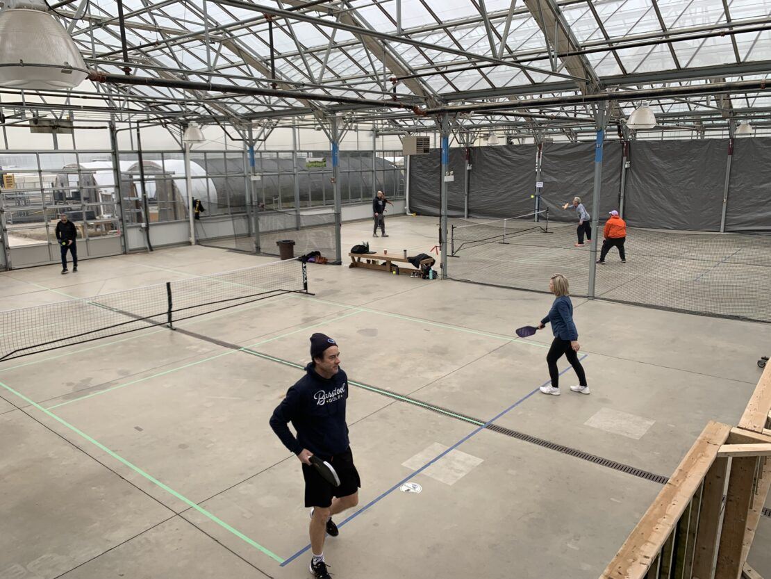 DeGroot's Nurseries uses its Vail a-frame greenhouse for pickleball courts during its off season.