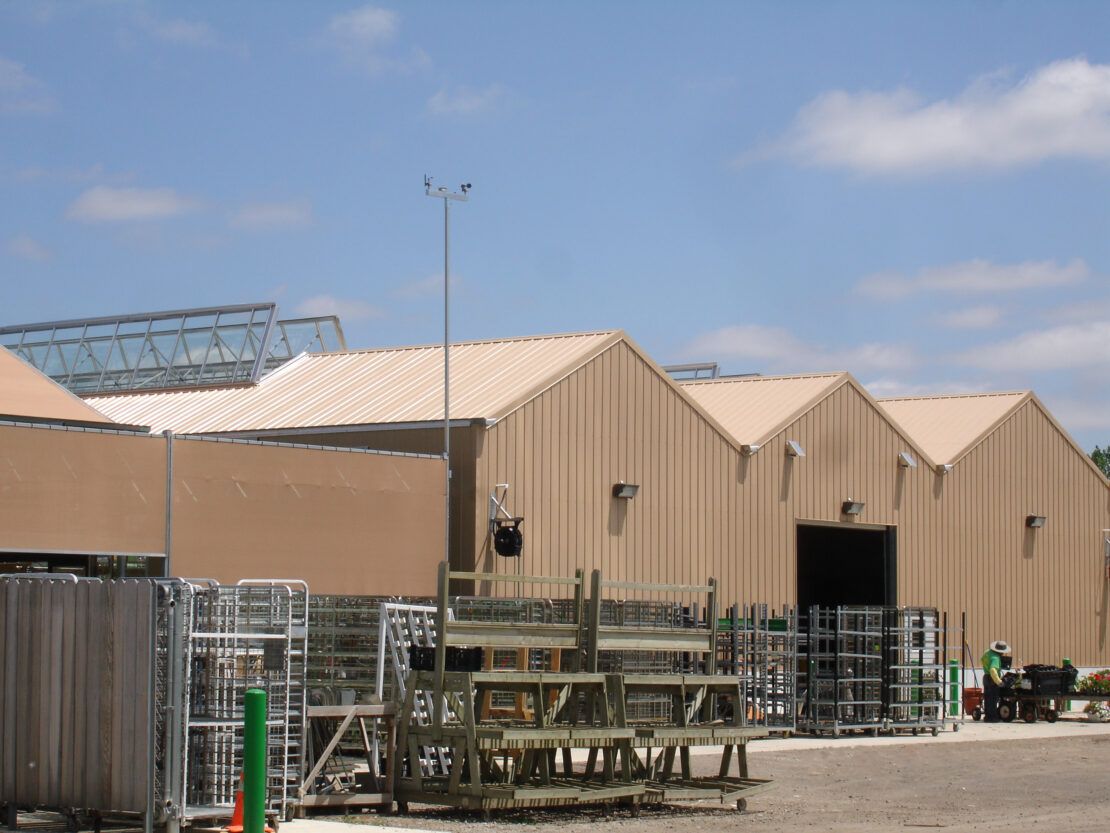 You can use the same greenhouse frame to create a warehouse by adding metal cladding.